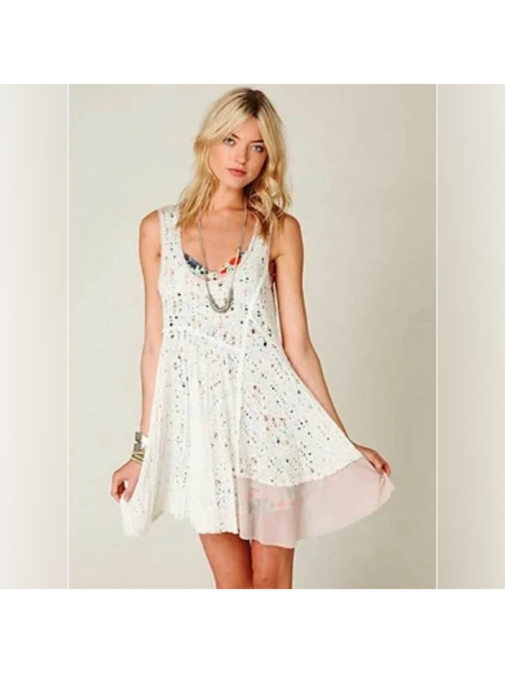 Free People White Sleeveless Lace Mini Dress with lace front and mesh panels